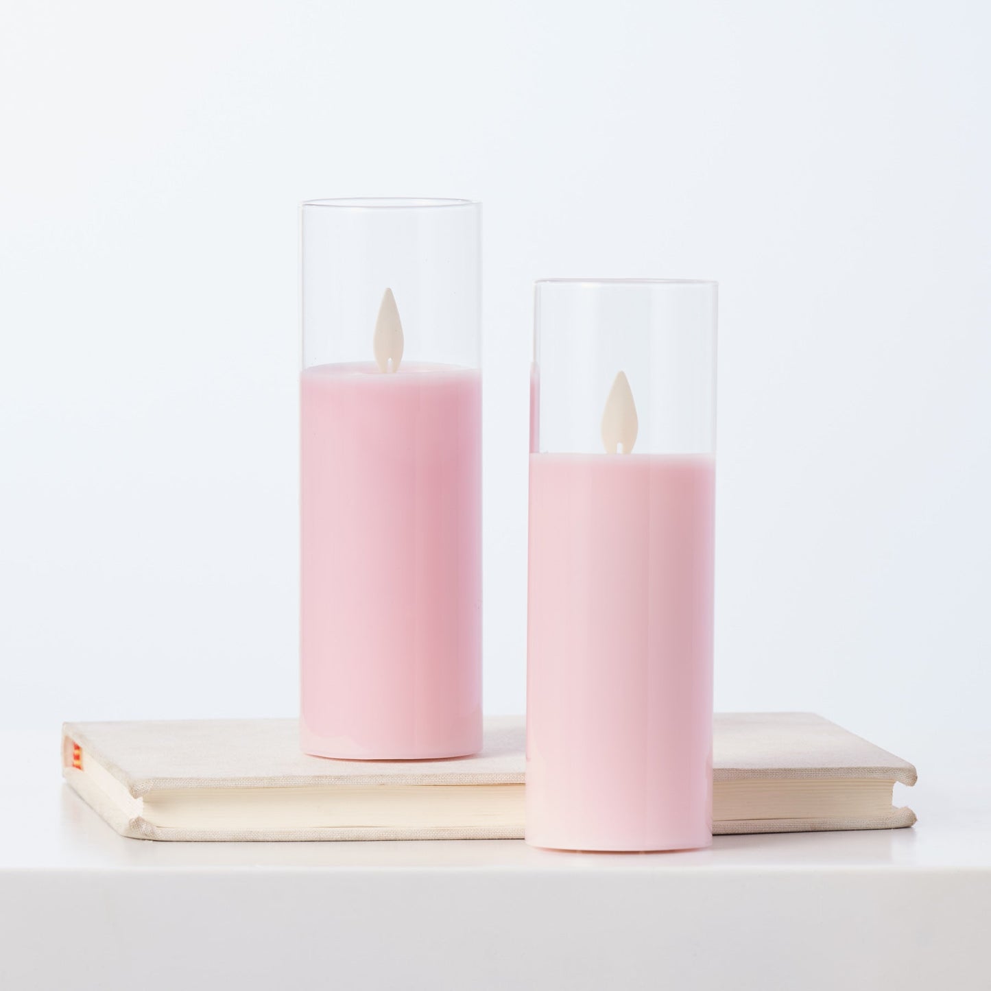 Bewegliche flameless LED rosa Glas Säulenkerzen mit Fernbedienung, Set von 2